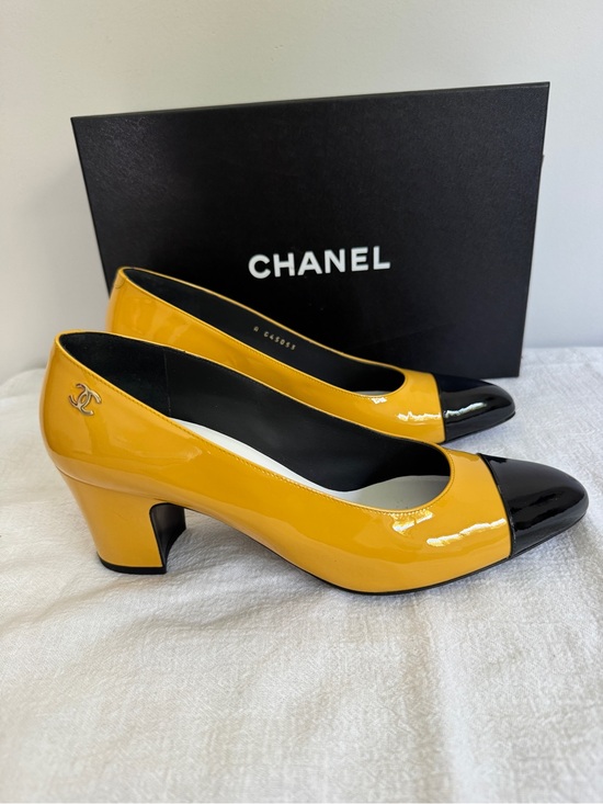 CHANEL Shoes - CHANEL Yellow Patent Leather Pumps with Black Cap Toe